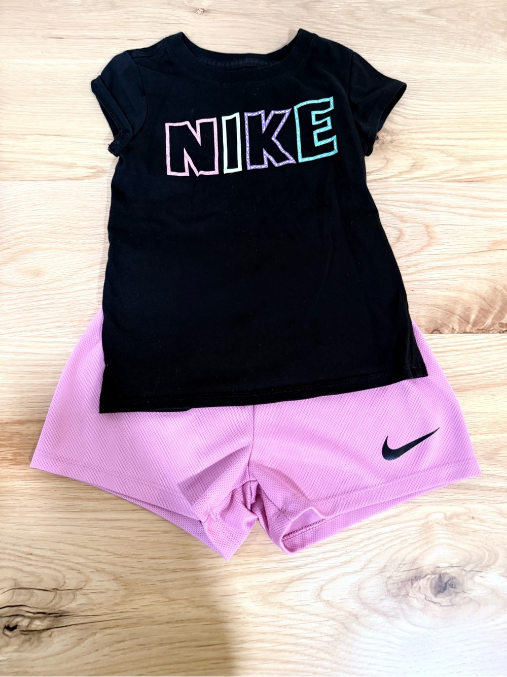 Nike Black Tee with Pastel Logo & Pink Athletic Shorts